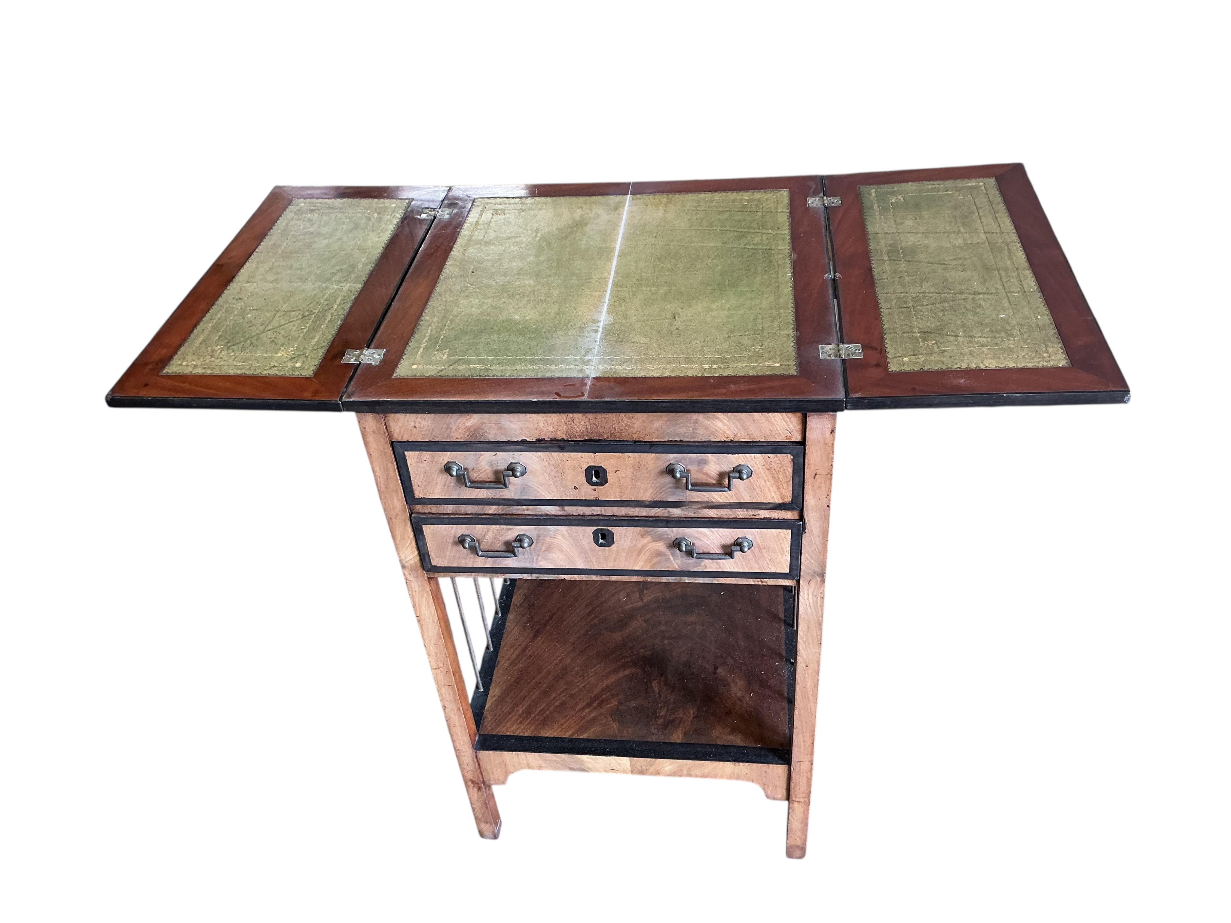 A George III ebony banded mahogany two drawer writing table, with leather lined twin flap top, width 48cm, depth 47cm, height 81cm